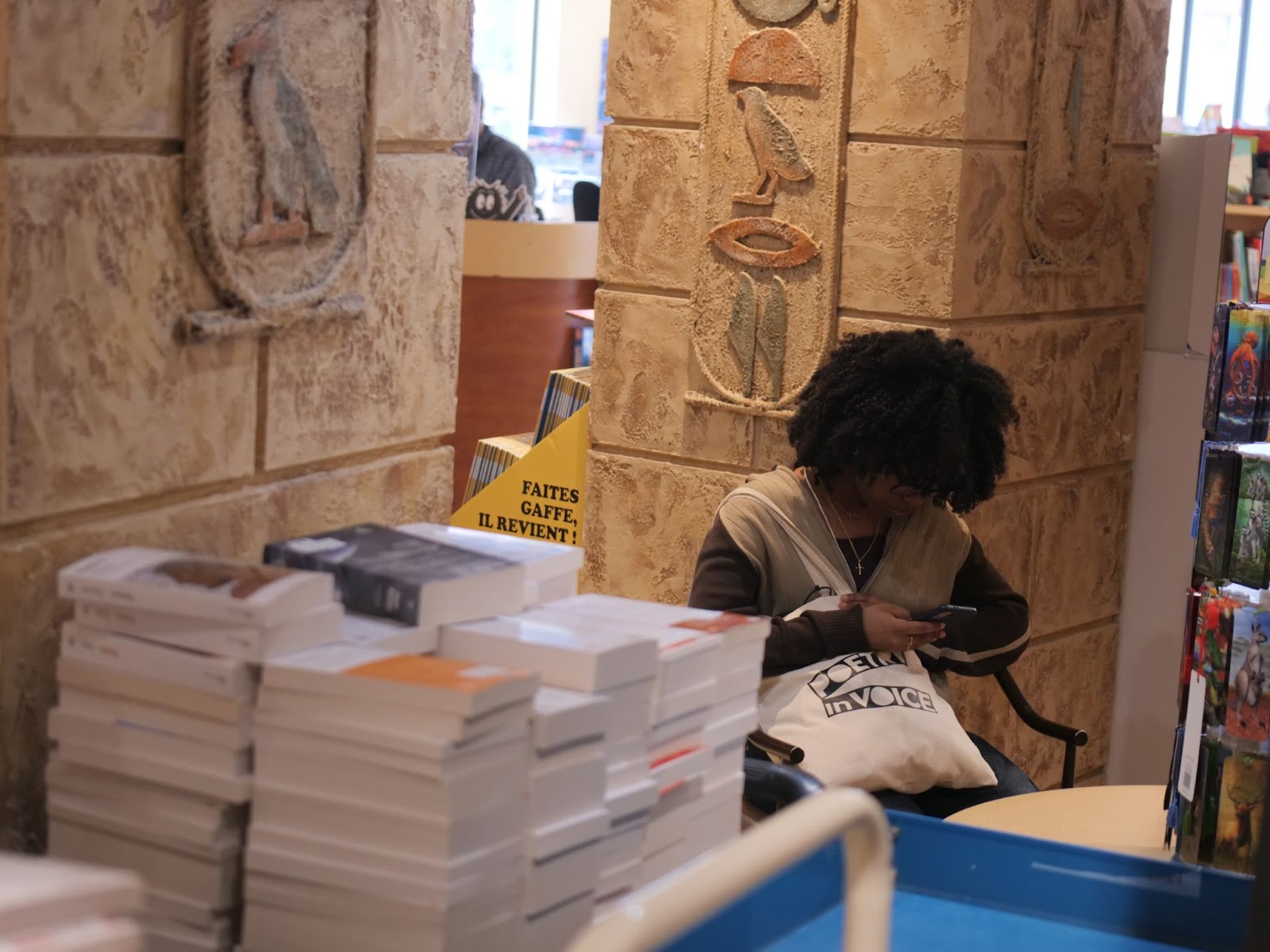 Finalist Daniela finds a quiet spot to work on her centos poem.