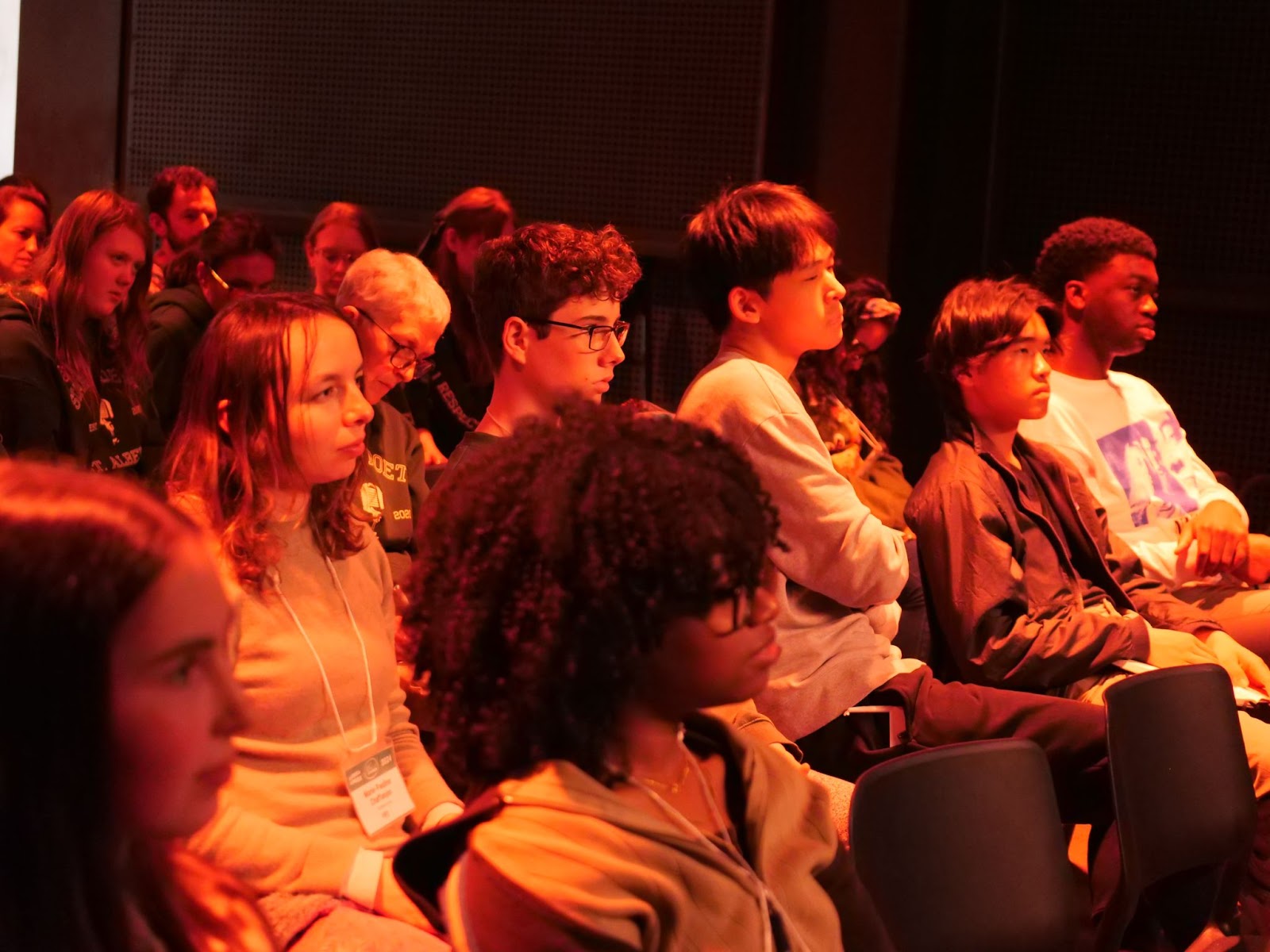 As the crowd listens intently.