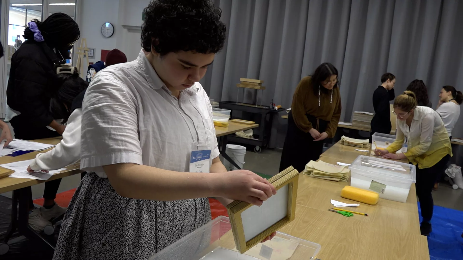 FutureVerser Tyler-Rose Arden works on making her paper.