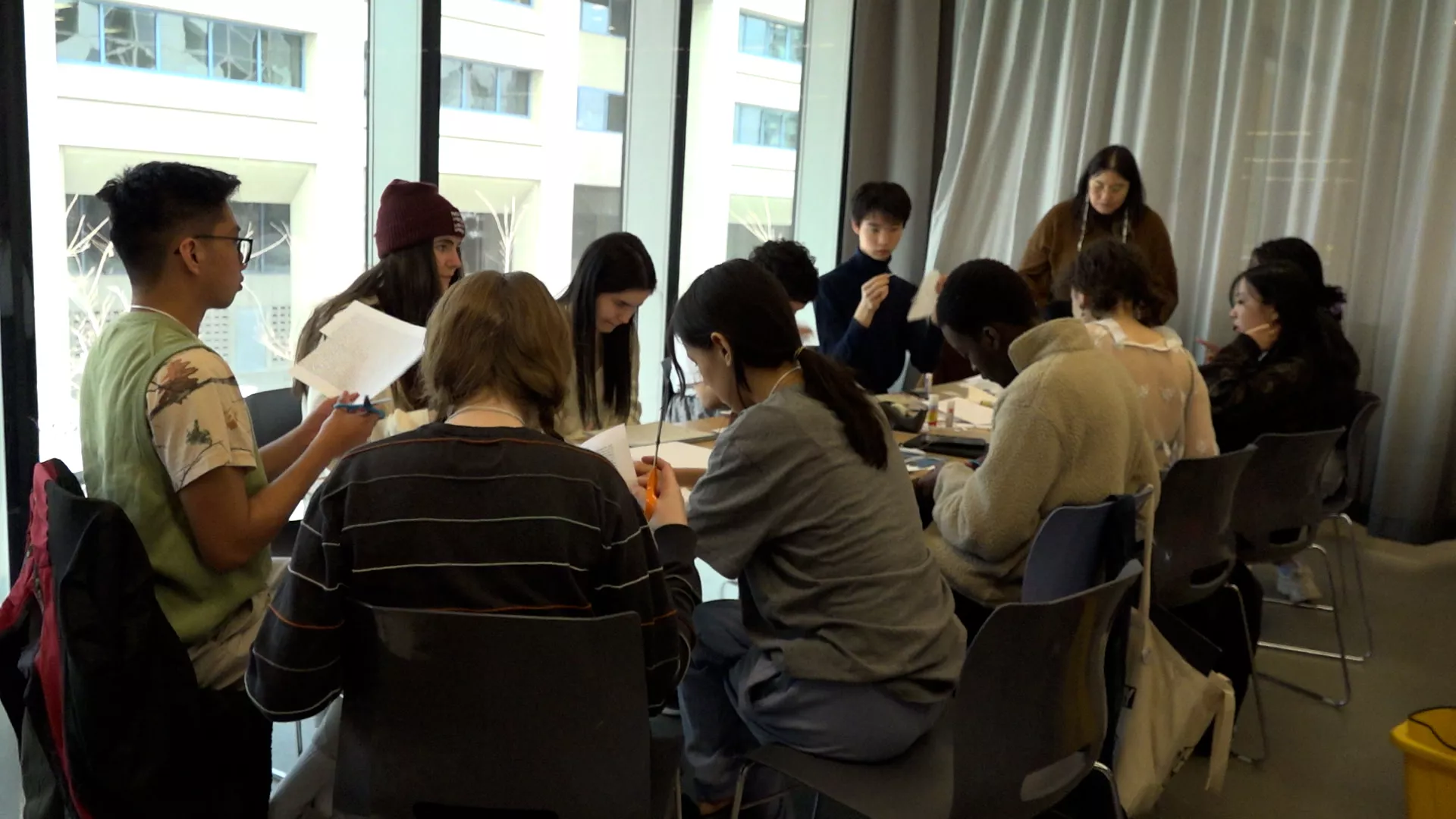 Students cut poetry lines of their own to create a cut-up poem.