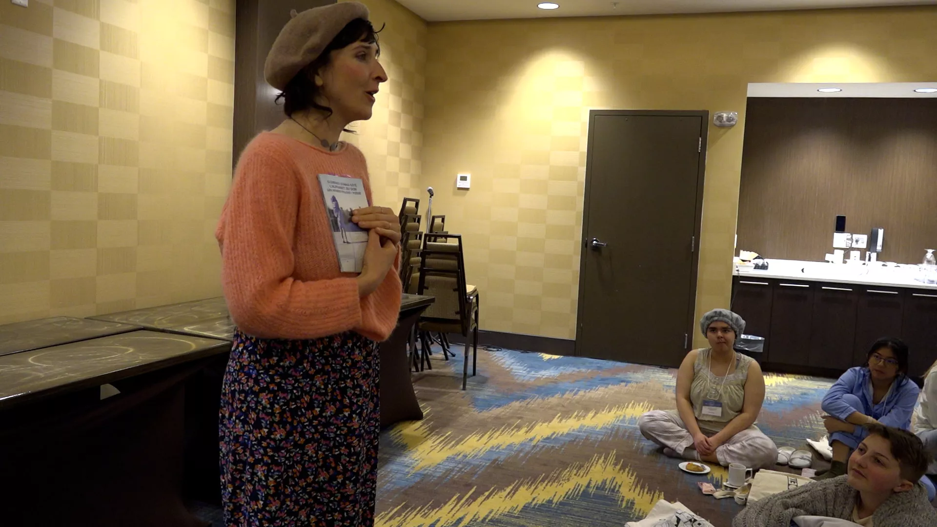 Clémence shares a poem aloud.