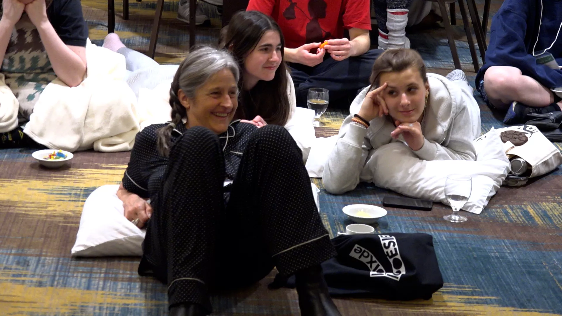 English Program Coordinator Tessa Griffin joins the students in the audience.