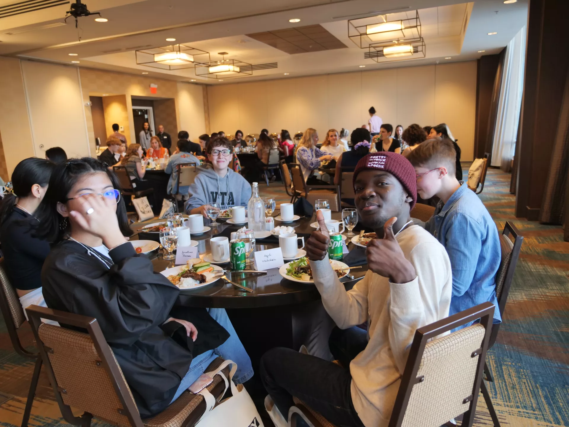 FutureVerser Aquil Melchoir gives the thumbs up to the first meal together at the Hilton Garden Inn Calgary Downtown.