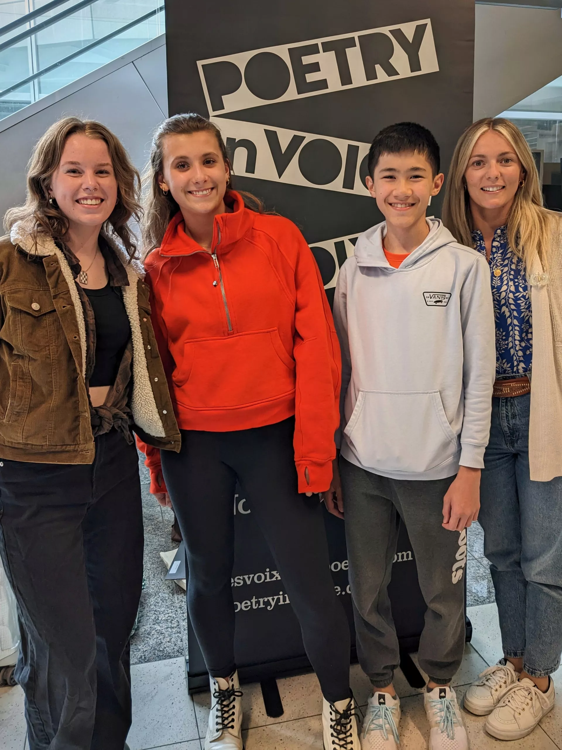 FutureVerser Ella Bachrach and National Finalists Olivia Bridgman and Phillippe Morissette and their teacher Leslie Bonniveau are greeted at the Calgary International Airport by our staff.