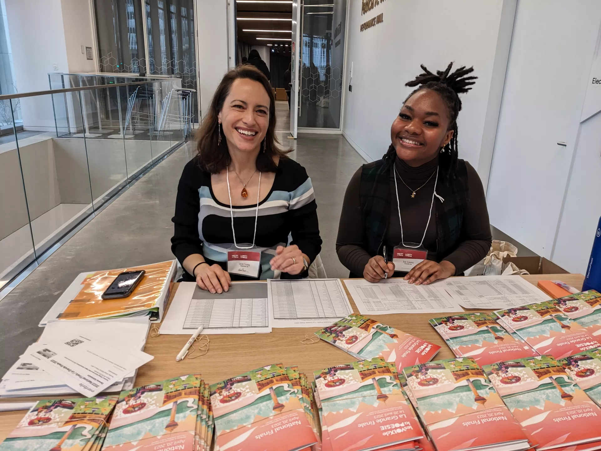 Sarah Tsiang and Star Ezeana welcome the public with their most beautiful smiles at the Patricia A. Whelan Performance Hall.