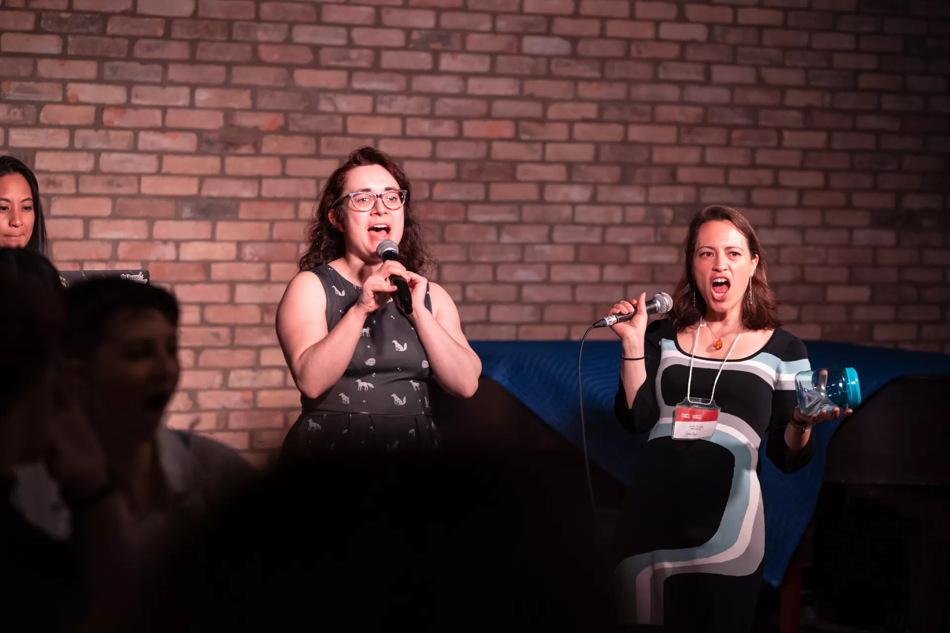 Ariane Tapp and Sarah Tsiang host the after-show cabaret open-mic.