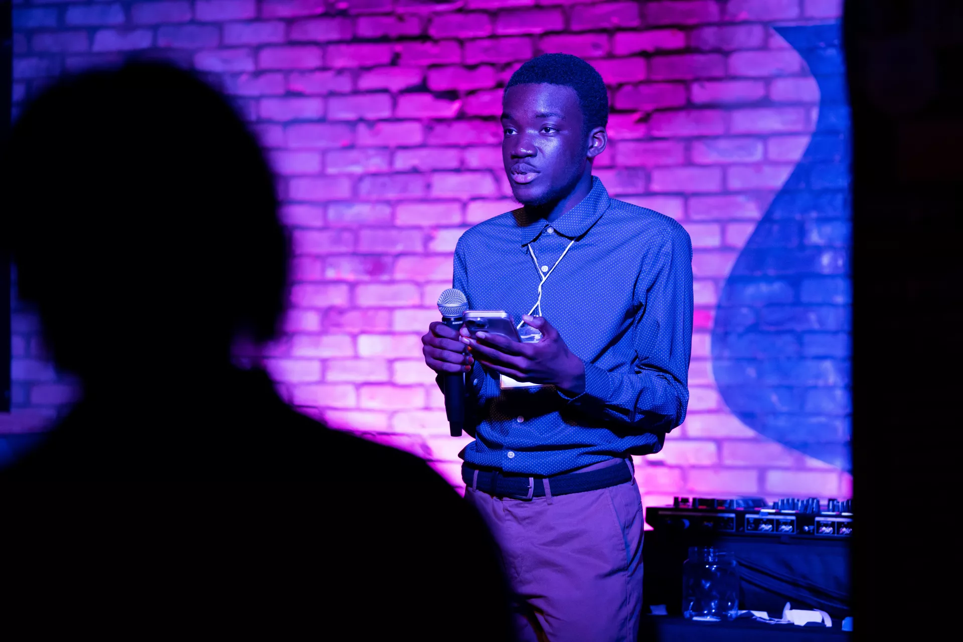 Aqil Mechoir reads one of his poems for the crowd.