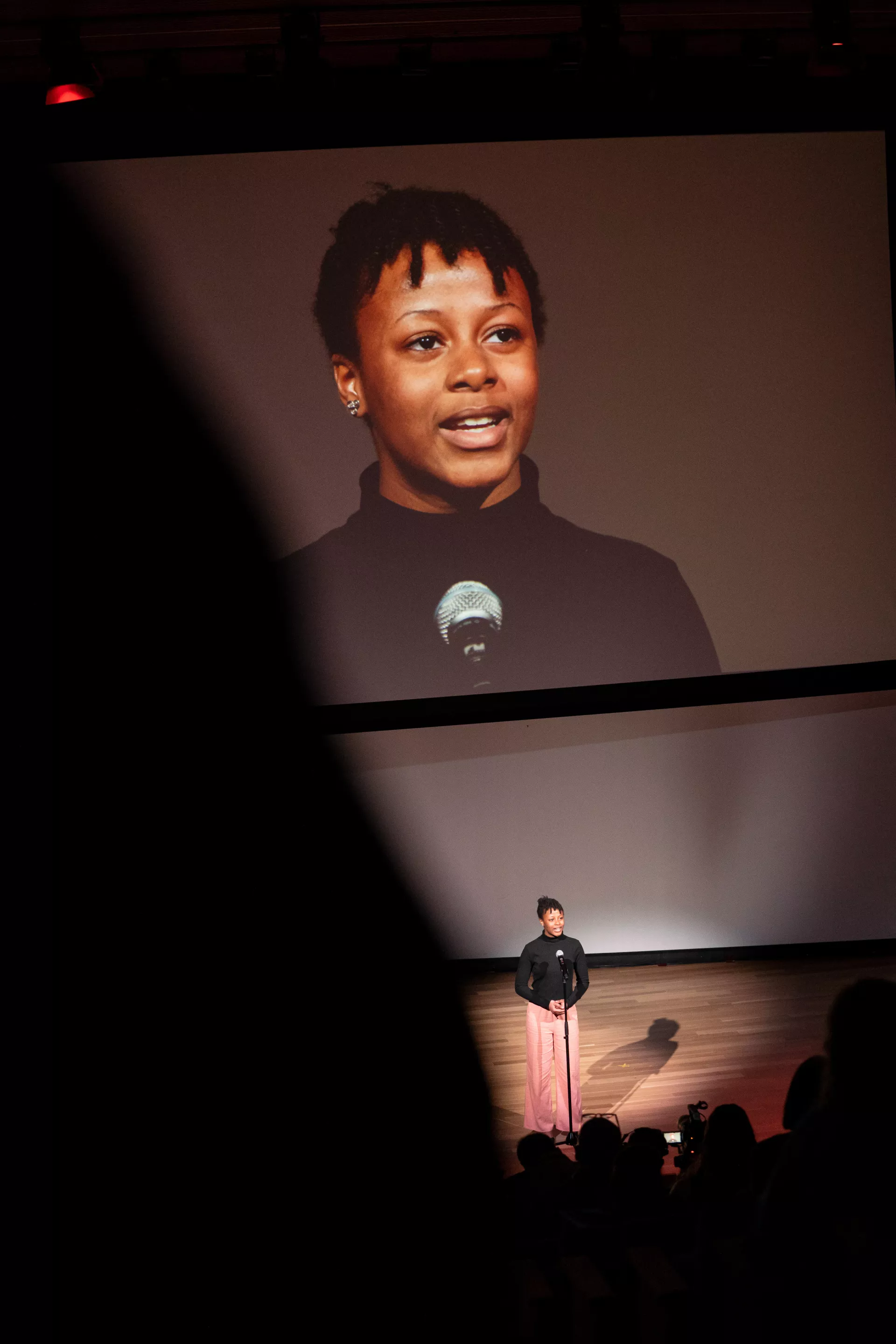 Hope Anaky stuns the crowd with her recitation of « Ma mère me jongle... » by Patrice Desbiens.