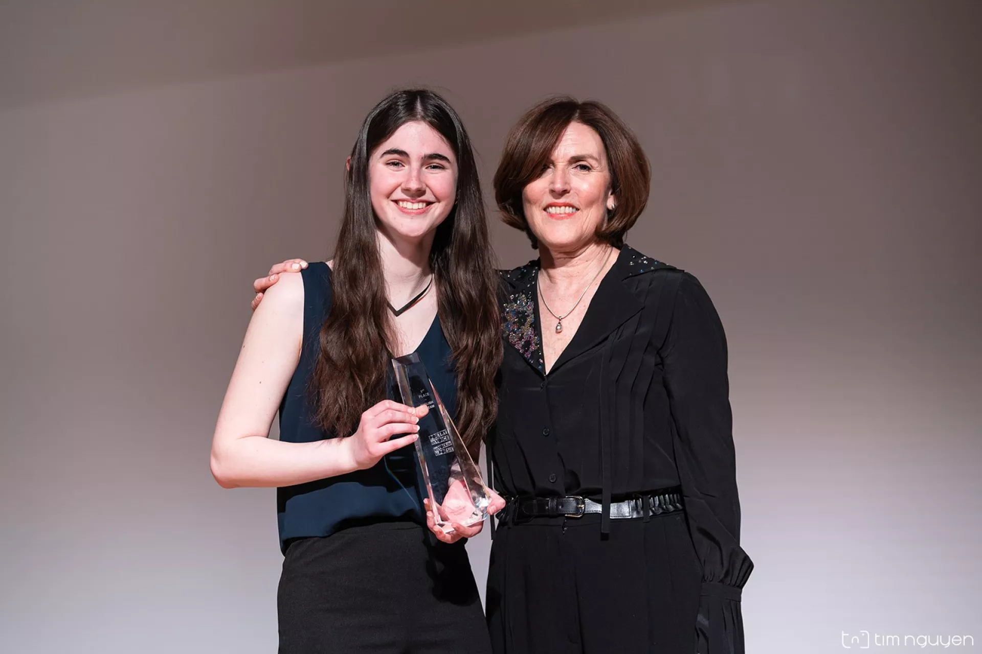 Maia Cassie beams as the first place winner in the English category.